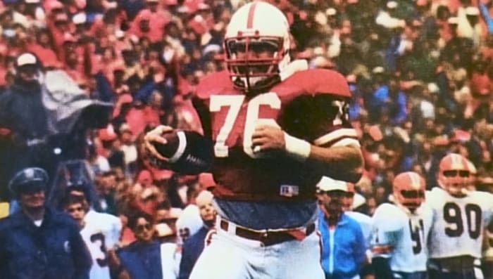 Defensive tackle Chris Spachman's 38-yard interception return puts the Huskers over the 50-point mark against the Fighting Illini.
